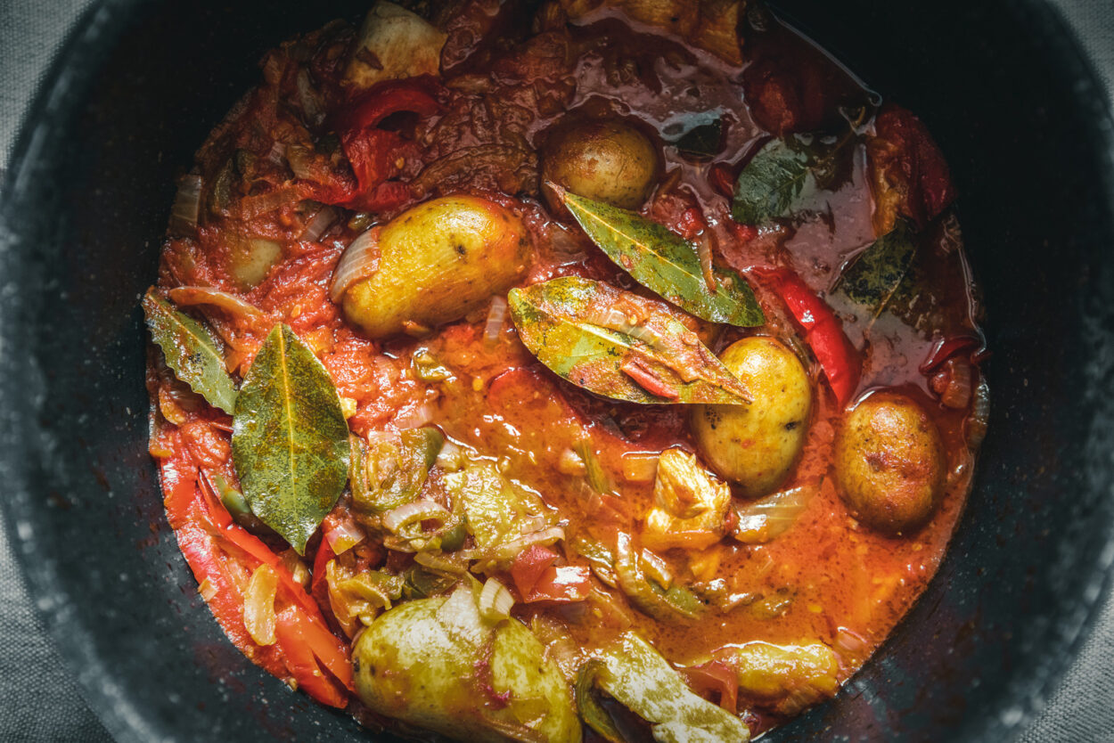 Basque chicken simmering Poulet basquaise